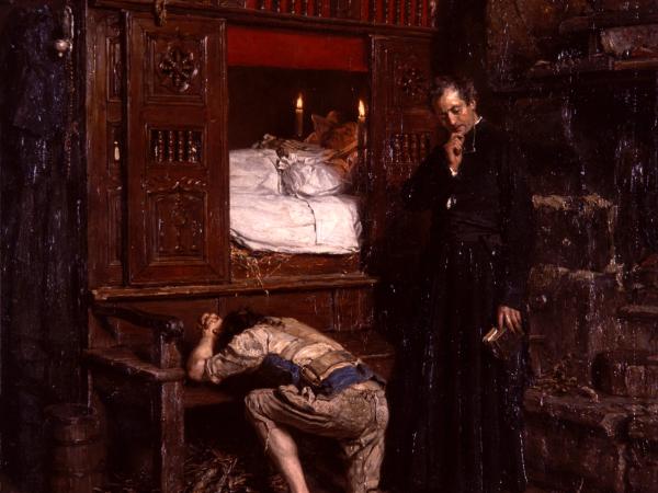 A man and his son at the bedside of their mother.