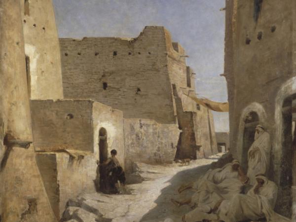 Group of people sleeping on the stone steps in a narrow village street