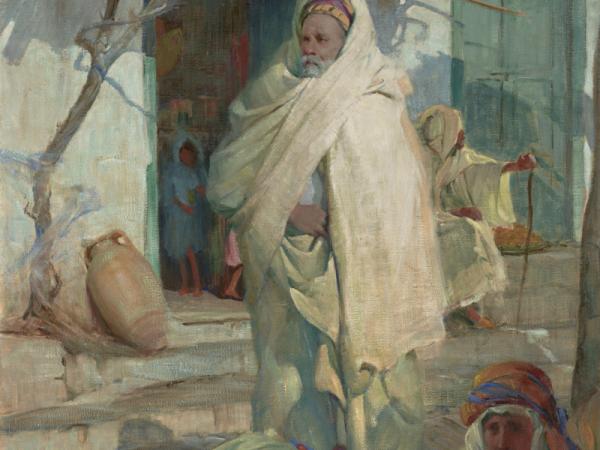 Confident man dressed in white cloth standing up in a residential street 