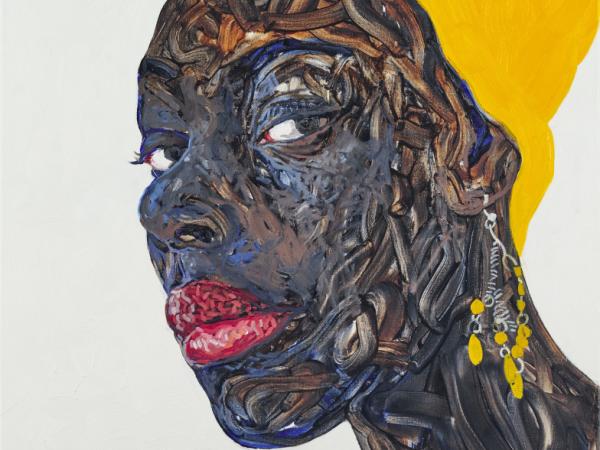  Profile of a Black woman wearing a yellow headwrap