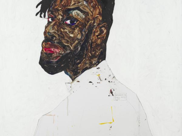 Profile of a Black man wearing white clothing