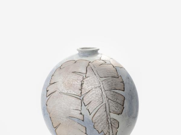 Circular flask-shaped ceramic sculpture