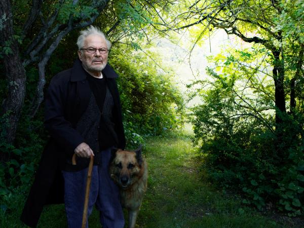 Maurice Sendak in a green, leafy forest
