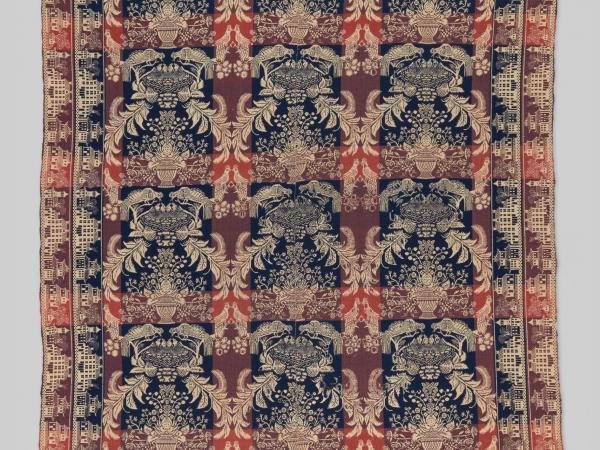 Linen and wool blanket with repeating blue floral pattern