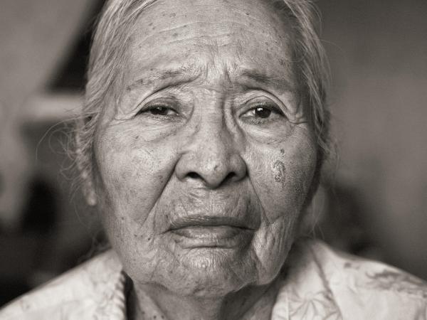 Black and white photograph of an elder Navajo woman