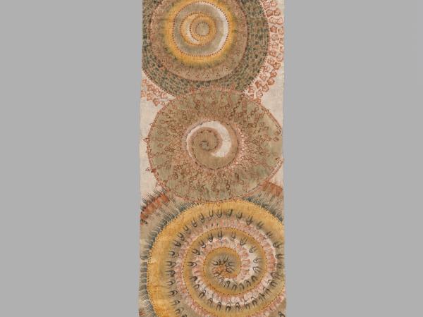 Tall and skinny cloth embroidered with large overlapping circular designs