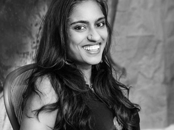 Black and white photo of Chitra Ganesh, a dark-haired woman in her 30s