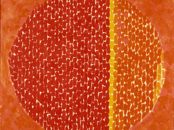 Square orange painting with a circular red and lighter orange circle in the middle