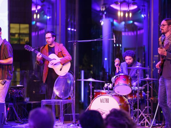 Men in a band performing on stage
