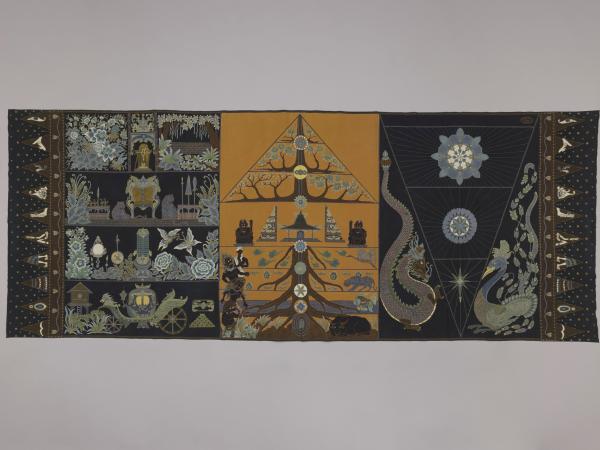 Black cotton designed cloth with panels of dragons and other iconography