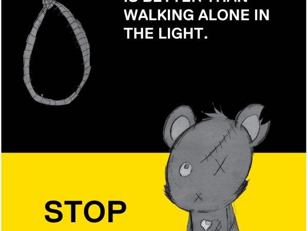 a noose next to the words walking with a friend in the dark is better than walking alone in the light and a stuffed toy next to the words stop teen suicide