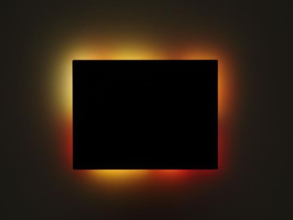 Black rectangle shape with orange, red, and yellow hues radiating from it to resemble a fire
