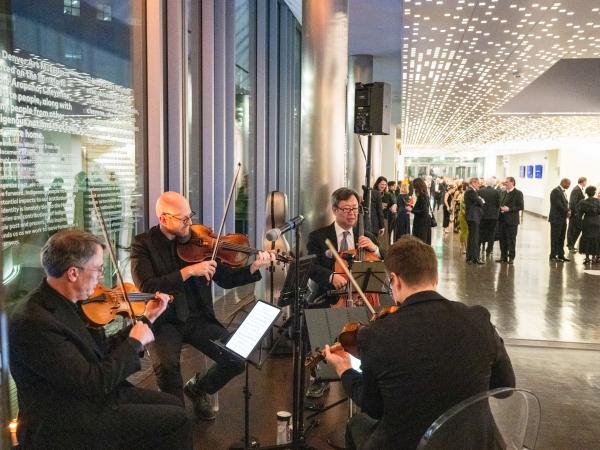 A string quartet playing inside the museum