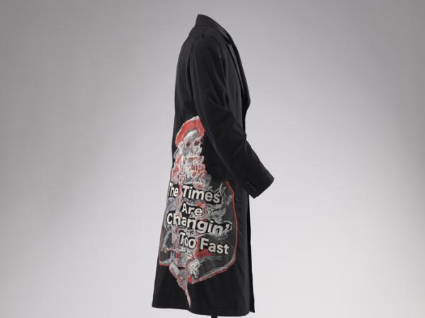 Tall black jacket with "the times are a'changin" embroidered in text