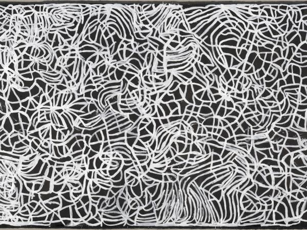 Tranluscent intertwining strands of white rope-like swirls