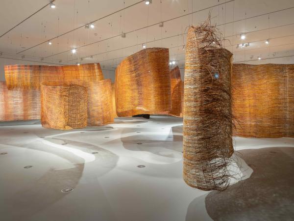 Hanging installation made out of bush cane and textiles