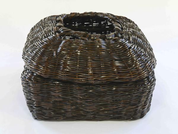 Square-shaped basket made out of black bamboo