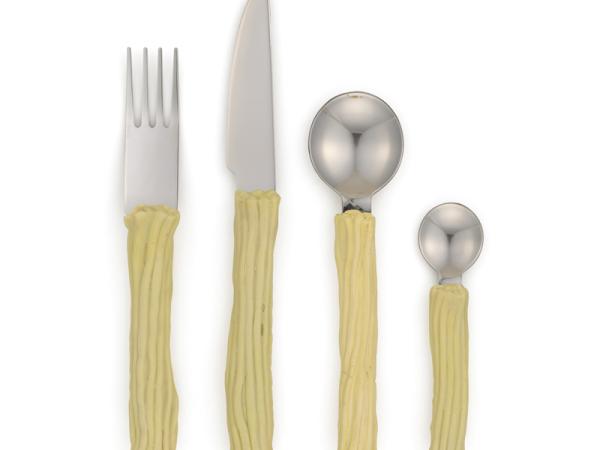 Fork, knife, and two spoons with yellow handles