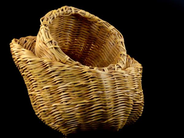 Basket made out of split and leached bamboo