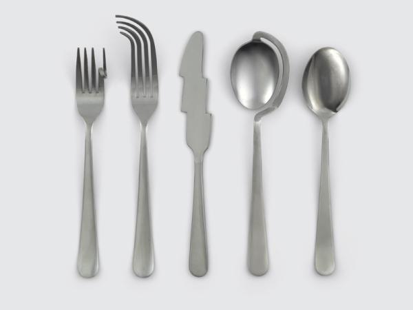 Japanese-made set of cutlery, with curvey edges