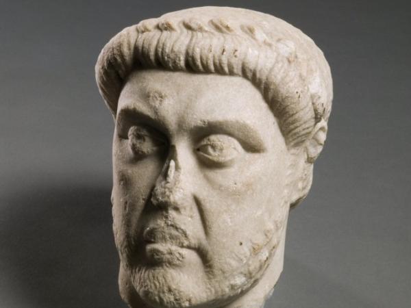 a white ceramic bust of a man's head