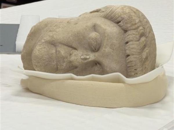 the bust on its side on a table