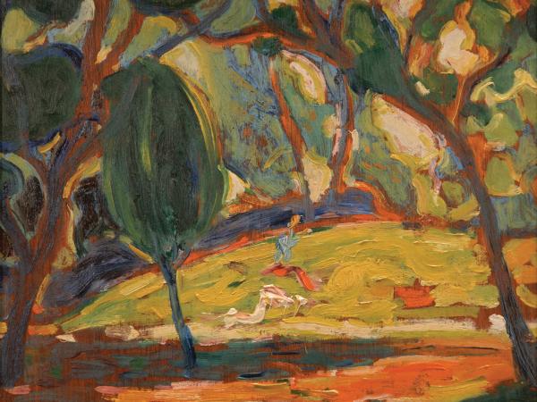 Autumnal forest landscape with a figure in motion in the center of the frame