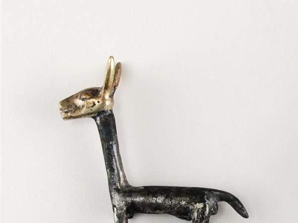 Small sculpture of a four-legged cat-like creature