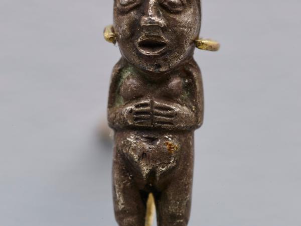 Bronze sculpture of a standing Incan female figure