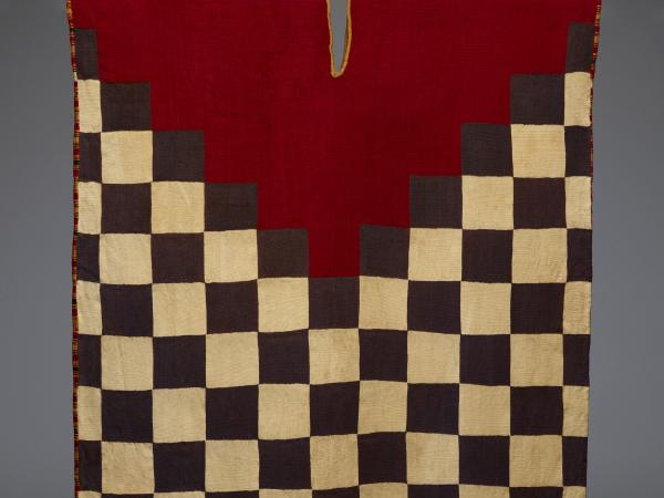 Checkered-patterned textile with bright red ends