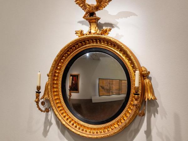 round gold mirror