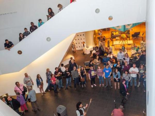 people on all levels of the atrium in the Hamilton Building stairway