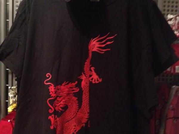 A black t-shirt with a red Chinese dragon