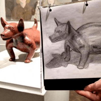 photo of a drawing of a dog statute by a student at a drop-in drawing class in Stampede