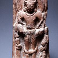 Terracotta sculpture of the Vishnu figure sitting on a throne