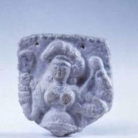 Stone carving plaque of a woman figure