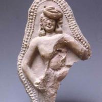 Plaque of Indian woman figure in stone