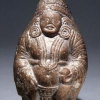Oval shaped stone carving of an Indian royalty figure