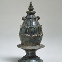 Egg cylinder-shaped bronze statue