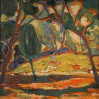 Autumnal nature setting with overhanging trees and orange leaves