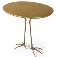 Wooden tabble with bird-like claw feet