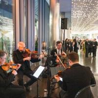 A string quartet playing inside the museum