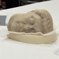 the bust on its side on a table