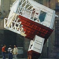 Outdoor installation of an upside down small church-like structure