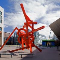 Abstract outdoor sculpture of intertwining shapes and angles