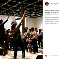 Instagram photo of the Flobots interacting with visitors at the Denver Art Museum.