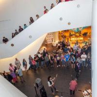 people on all levels of the atrium in the Hamilton Building stairway