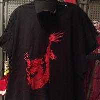 A black t-shirt with a red Chinese dragon