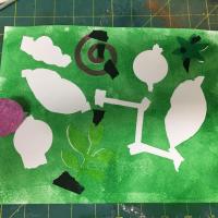 Cut out shapes are removed from the paper and reveal negative space.