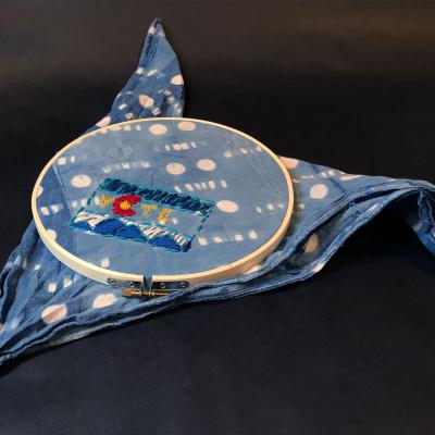 An example of a finished embroidered bandanna